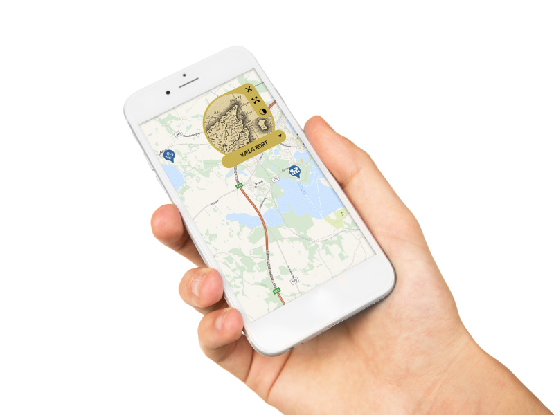 Hånd holder en mobiltelefon hvor man kan se et kort